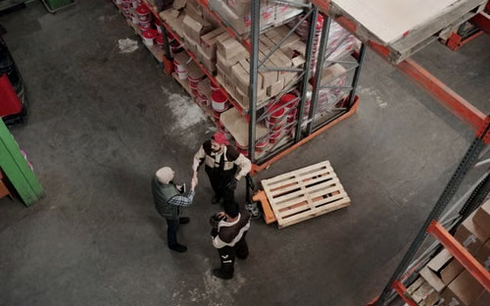 Staff meeting on a warehouse floor